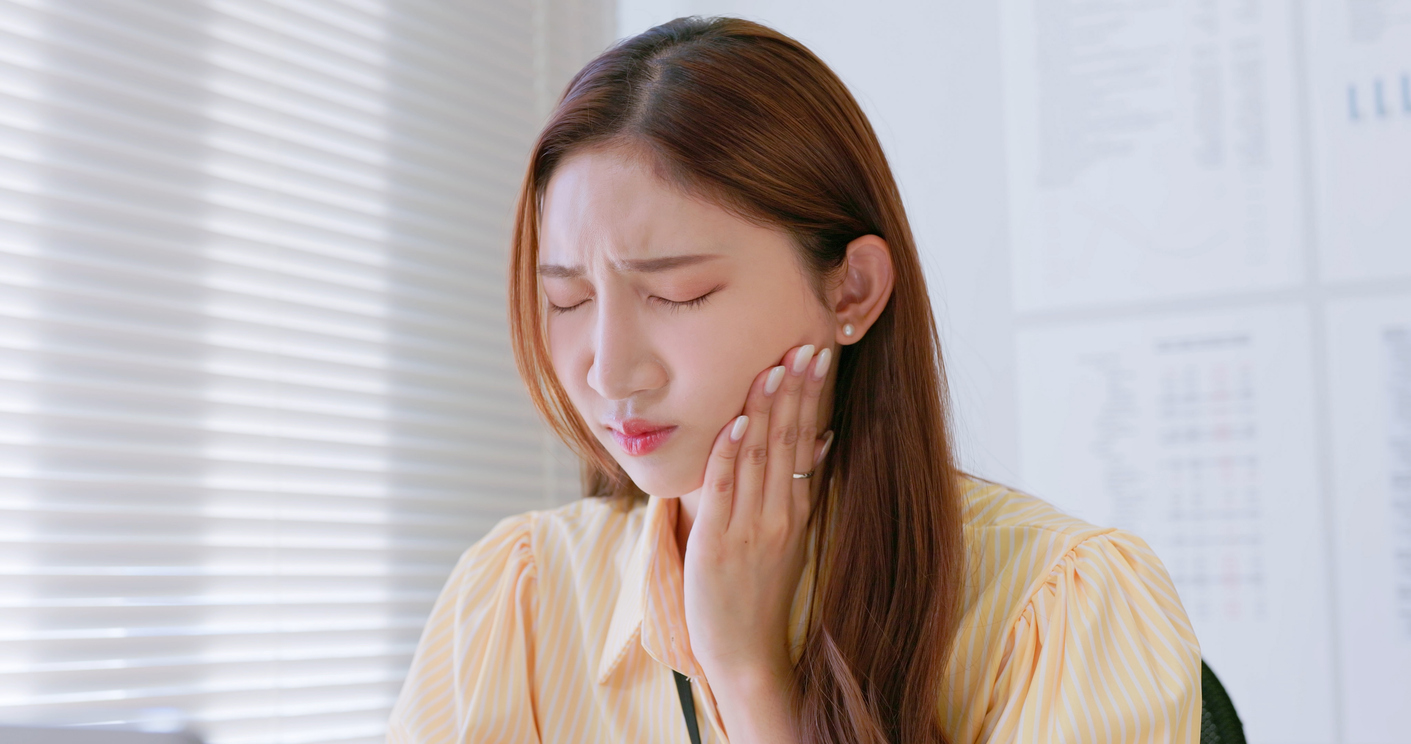 businesswoman has toothache