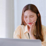 businesswoman has toothache